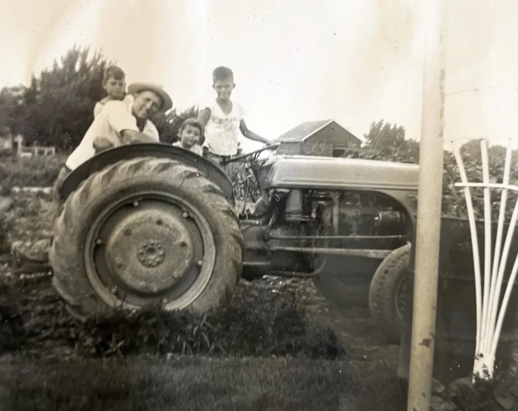 first generation farmer on tractor